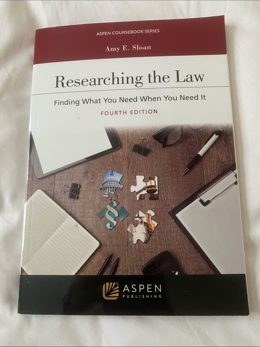 'Researching the Law' Textbook - Burgundy & White
